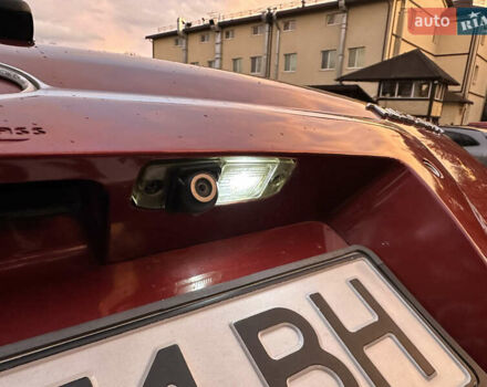 Красный Хендай Туксон, объемом двигателя 1.99 л и пробегом 145 тыс. км за 7999 $, фото 28 на Automoto.ua