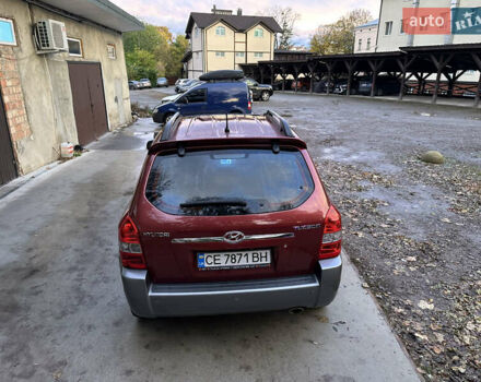 Красный Хендай Туксон, объемом двигателя 1.99 л и пробегом 145 тыс. км за 7999 $, фото 13 на Automoto.ua