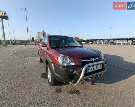Червоний Хендай Туксон, об'ємом двигуна 1.98 л та пробігом 251 тис. км за 8500 $, фото 3 на Automoto.ua