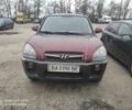 Красный Хендай Туксон, объемом двигателя 2 л и пробегом 207 тыс. км за 8479 $, фото 1 на Automoto.ua