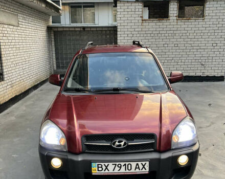 Красный Хендай Туксон, объемом двигателя 1.98 л и пробегом 160 тыс. км за 7900 $, фото 21 на Automoto.ua