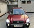 Красный Хендай Туксон, объемом двигателя 1.98 л и пробегом 160 тыс. км за 7900 $, фото 21 на Automoto.ua