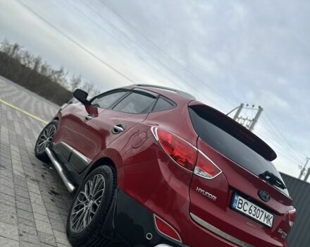 Красный Хендай Туксон, объемом двигателя 2.4 л и пробегом 220 тыс. км за 11000 $, фото 5 на Automoto.ua