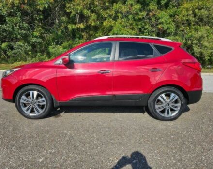 Червоний Хендай Туксон, об'ємом двигуна 2.4 л та пробігом 85 тис. км за 13100 $, фото 3 на Automoto.ua