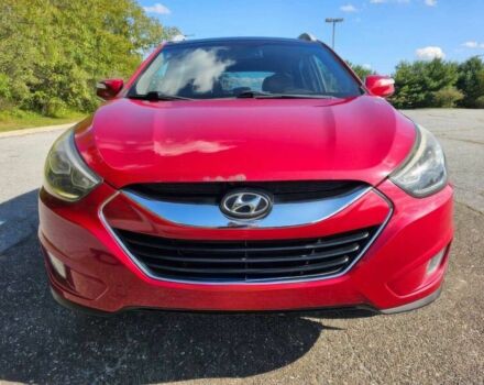 Червоний Хендай Туксон, об'ємом двигуна 2.4 л та пробігом 85 тис. км за 13100 $, фото 1 на Automoto.ua