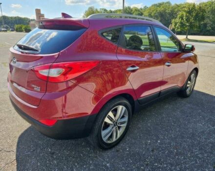 Червоний Хендай Туксон, об'ємом двигуна 2.4 л та пробігом 85 тис. км за 13100 $, фото 6 на Automoto.ua