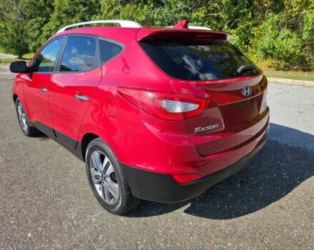 Червоний Хендай Туксон, об'ємом двигуна 2.4 л та пробігом 85 тис. км за 13100 $, фото 4 на Automoto.ua