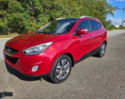 Червоний Хендай Туксон, об'ємом двигуна 2.4 л та пробігом 85 тис. км за 13100 $, фото 2 на Automoto.ua