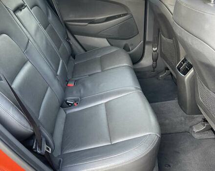 Красный Хендай Туксон, объемом двигателя 1.59 л и пробегом 123 тыс. км за 14600 $, фото 7 на Automoto.ua