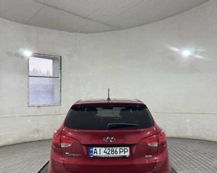 Хендай Туксон 2015 в Белой Церкве на Automoto.ua Красный Хендай Туксон, объемом двигателя 2 л и пробегом 174 тыс. км за 13500 $, фото 9 на Automoto.ua