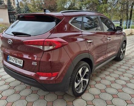 Красный Хендай Туксон, объемом двигателя 2 л и пробегом 97 тыс. км за 20500 $, фото 2 на Automoto.ua