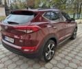 Красный Хендай Туксон, объемом двигателя 2 л и пробегом 97 тыс. км за 20500 $, фото 2 на Automoto.ua