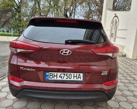 Красный Хендай Туксон, объемом двигателя 2 л и пробегом 97 тыс. км за 20500 $, фото 4 на Automoto.ua