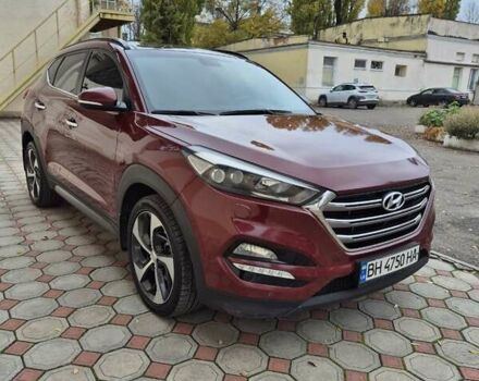 Красный Хендай Туксон, объемом двигателя 2 л и пробегом 97 тыс. км за 20500 $, фото 1 на Automoto.ua