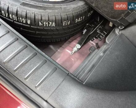 Красный Хендай Туксон, объемом двигателя 2 л и пробегом 97 тыс. км за 20500 $, фото 13 на Automoto.ua