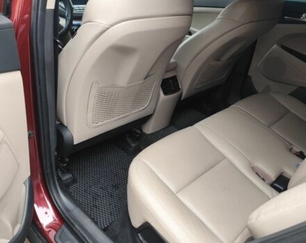 Червоний Хендай Туксон, об'ємом двигуна 2 л та пробігом 110 тис. км за 19800 $, фото 8 на Automoto.ua