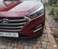 Красный Хендай Туксон, объемом двигателя 2.02 л и пробегом 110 тыс. км за 19800 $, фото 3 на Automoto.ua