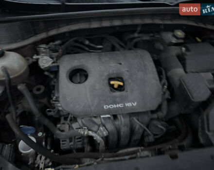 Красный Хендай Туксон, объемом двигателя 2 л и пробегом 110 тыс. км за 17000 $, фото 14 на Automoto.ua