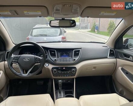 Червоний Хендай Туксон, об'ємом двигуна 1.6 л та пробігом 65 тис. км за 15500 $, фото 27 на Automoto.ua