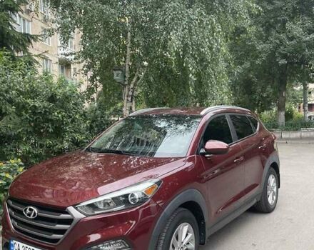 Красный Хендай Туксон, объемом двигателя 2 л и пробегом 93 тыс. км за 15800 $, фото 2 на Automoto.ua