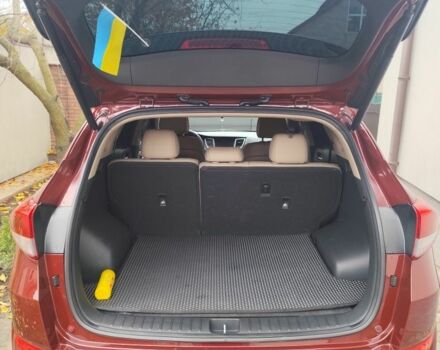 Червоний Хендай Туксон, об'ємом двигуна 2 л та пробігом 110 тис. км за 19800 $, фото 13 на Automoto.ua