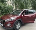 Красный Хендай Туксон, объемом двигателя 2 л и пробегом 93 тыс. км за 15800 $, фото 7 на Automoto.ua
