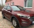 Красный Хендай Туксон, объемом двигателя 2 л и пробегом 123 тыс. км за 15300 $, фото 2 на Automoto.ua
