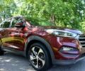 Красный Хендай Туксон, объемом двигателя 1.6 л и пробегом 79 тыс. км за 14600 $, фото 1 на Automoto.ua