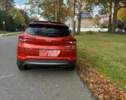 Червоний Хендай Туксон, об'ємом двигуна 1.6 л та пробігом 72 тис. км за 15500 $, фото 5 на Automoto.ua