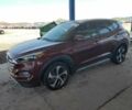 Красный Хендай Туксон, объемом двигателя 1.6 л и пробегом 130 тыс. км за 3600 $, фото 1 на Automoto.ua