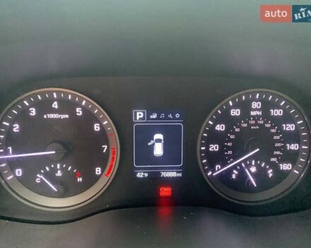 Красный Хендай Туксон, объемом двигателя 2 л и пробегом 123 тыс. км за 15300 $, фото 15 на Automoto.ua