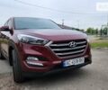 Червоний Хендай Туксон, об'ємом двигуна 2 л та пробігом 178 тис. км за 17000 $, фото 1 на Automoto.ua