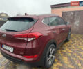 Красный Хендай Туксон, объемом двигателя 2 л и пробегом 110 тыс. км за 17000 $, фото 6 на Automoto.ua