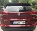 Красный Хендай Туксон, объемом двигателя 2 л и пробегом 93 тыс. км за 15800 $, фото 4 на Automoto.ua