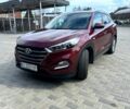 Красный Хендай Туксон, объемом двигателя 2 л и пробегом 225 тыс. км за 14100 $, фото 1 на Automoto.ua