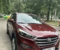 Красный Хендай Туксон, объемом двигателя 2 л и пробегом 93 тыс. км за 15800 $, фото 1 на Automoto.ua