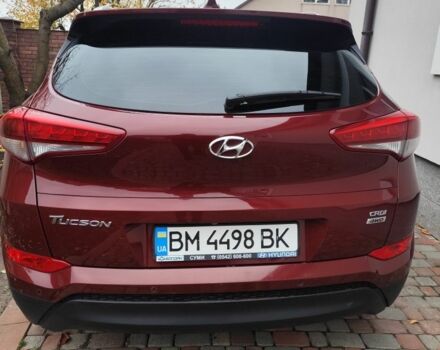 Червоний Хендай Туксон, об'ємом двигуна 2 л та пробігом 110 тис. км за 19800 $, фото 2 на Automoto.ua