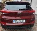 Червоний Хендай Туксон, об'ємом двигуна 2 л та пробігом 110 тис. км за 19800 $, фото 2 на Automoto.ua