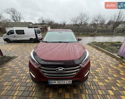Красный Хендай Туксон, объемом двигателя 2 л и пробегом 110 тыс. км за 17000 $, фото 8 на Automoto.ua