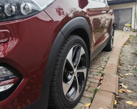 Червоний Хендай Туксон, об'ємом двигуна 2 л та пробігом 110 тис. км за 19800 $, фото 10 на Automoto.ua