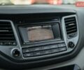Красный Хендай Туксон, объемом двигателя 2 л и пробегом 138 тыс. км за 16900 $, фото 21 на Automoto.ua