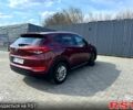 Красный Хендай Туксон, объемом двигателя 2 л и пробегом 225 тыс. км за 14100 $, фото 3 на Automoto.ua
