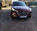 Красный Хендай Туксон, объемом двигателя 1.98 л и пробегом 110 тыс. км за 18999 $, фото 1 на Automoto.ua