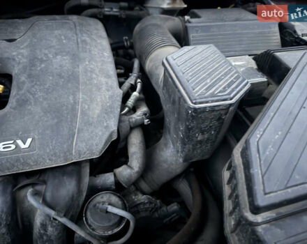 Красный Хендай Туксон, объемом двигателя 2 л и пробегом 110 тыс. км за 17000 $, фото 11 на Automoto.ua