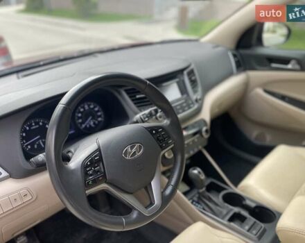 Червоний Хендай Туксон, об'ємом двигуна 1.6 л та пробігом 65 тис. км за 15500 $, фото 16 на Automoto.ua