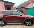 Красный Хендай Туксон, объемом двигателя 2 л и пробегом 123 тыс. км за 15300 $, фото 3 на Automoto.ua