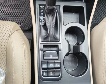 Красный Хендай Туксон, объемом двигателя 2.02 л и пробегом 110 тыс. км за 19800 $, фото 62 на Automoto.ua