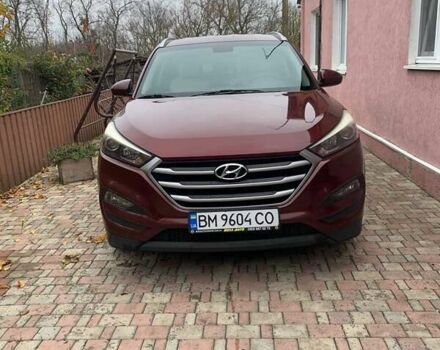 Красный Хендай Туксон, объемом двигателя 2 л и пробегом 123 тыс. км за 15300 $, фото 1 на Automoto.ua