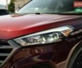 Красный Хендай Туксон, объемом двигателя 2 л и пробегом 138 тыс. км за 16900 $, фото 13 на Automoto.ua