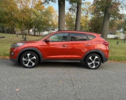 Червоний Хендай Туксон, об'ємом двигуна 1.6 л та пробігом 72 тис. км за 15500 $, фото 3 на Automoto.ua